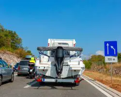 Can You Pull A Boat Behind A Travel Trailer? (State Laws)